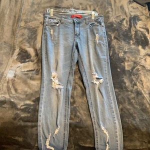 Skinny blue ripped jeans. only worn once.